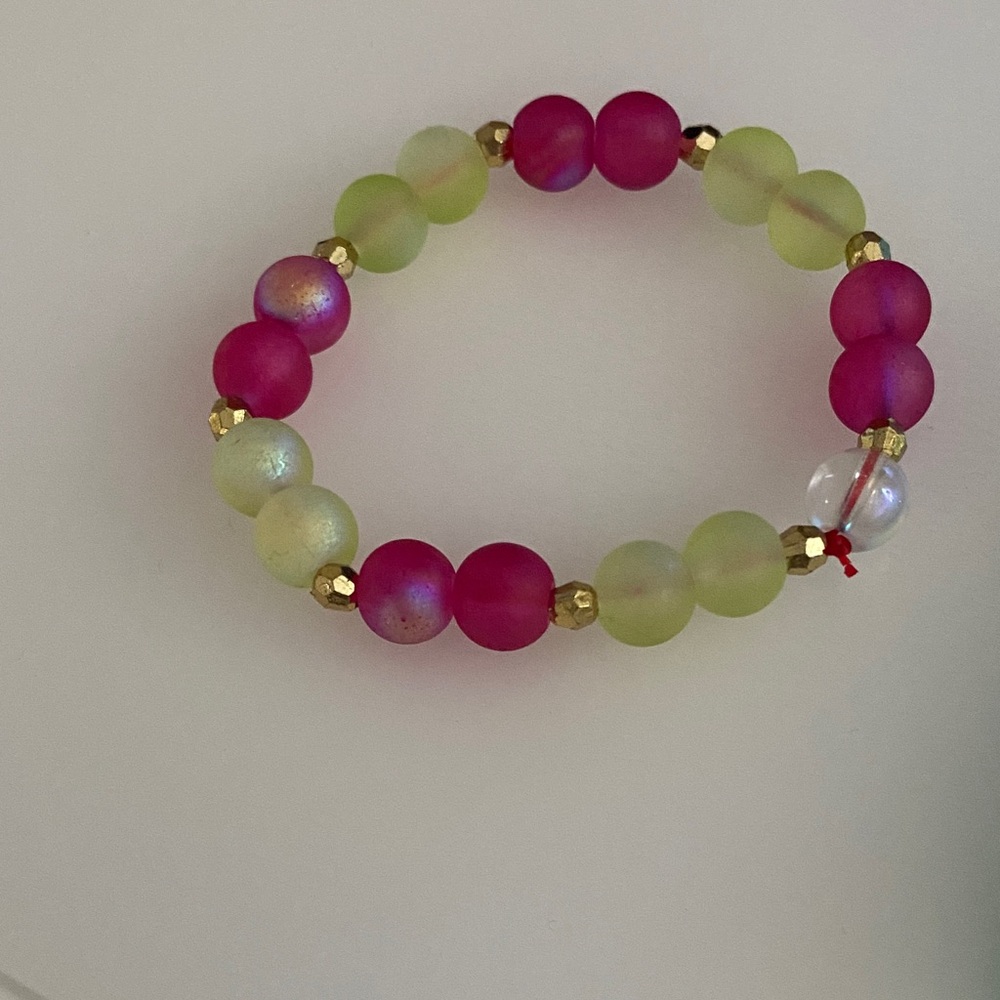 green and pink bracelet